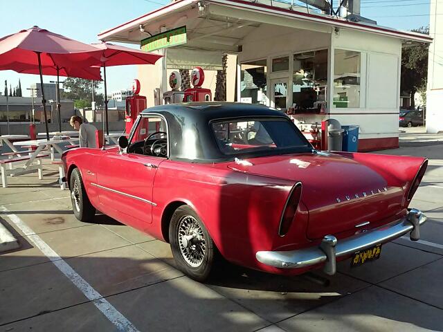 Series 2 outside a vintage gas station.